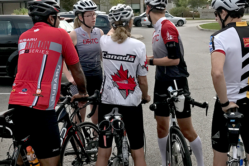 group of DRTC members standing with their road bikes